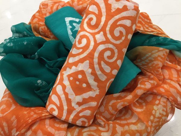 Traditional orange batik patches print cotton salwar kameez with pure chiffon chunni