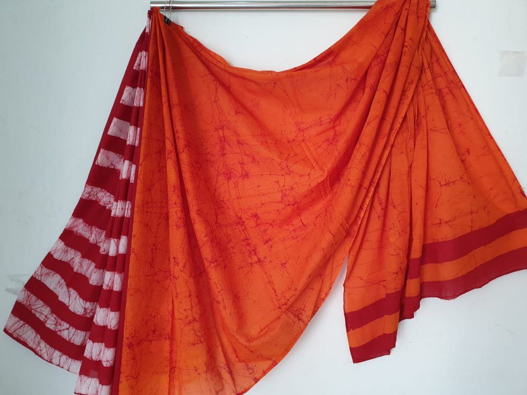 Superior quality orange-red batik print Pure mulmul saree with blouse
