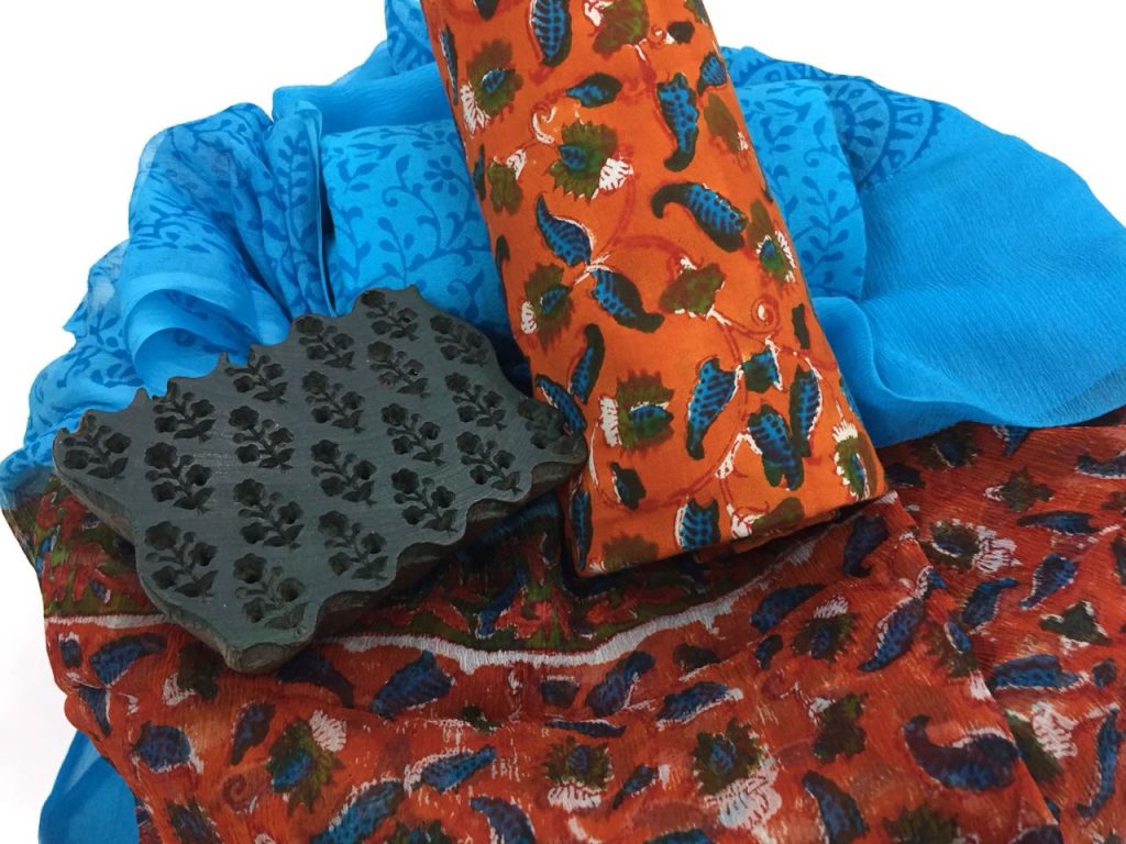 Unstitched orange-red rapid print orange-red cotton salwar kameez set with pure chiffon dupatta