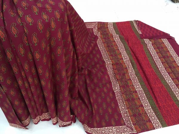 Maroon regular wear kerry bagru print cotton sarees with blouse piece