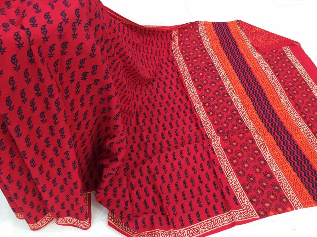 Red casual wear booty bagru print cotton sarees with blouse piece