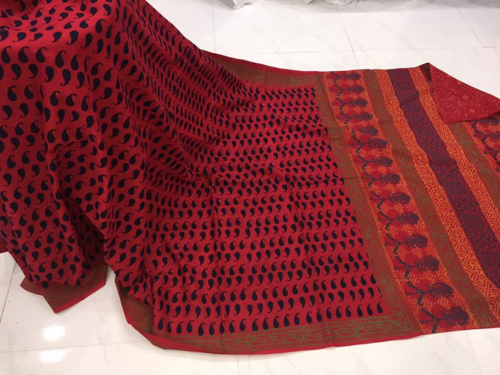 Red daily wear kerry bagru print cotton sarees with blouse piece