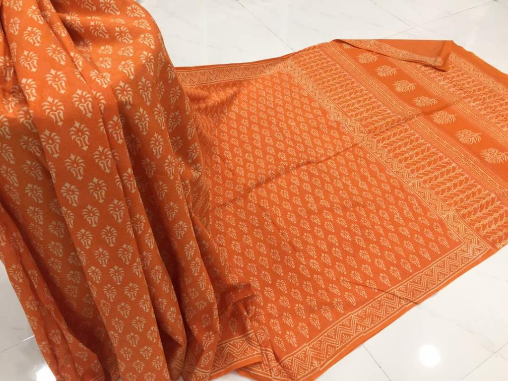 Orange daily wear booty bagru print cotton sarees with blouse piece