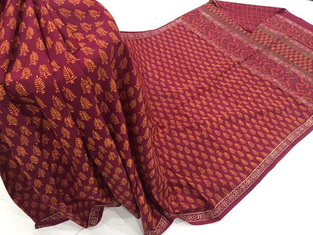 Natural maroon casual wear leaf bagru print cotton sarees with blouse piece