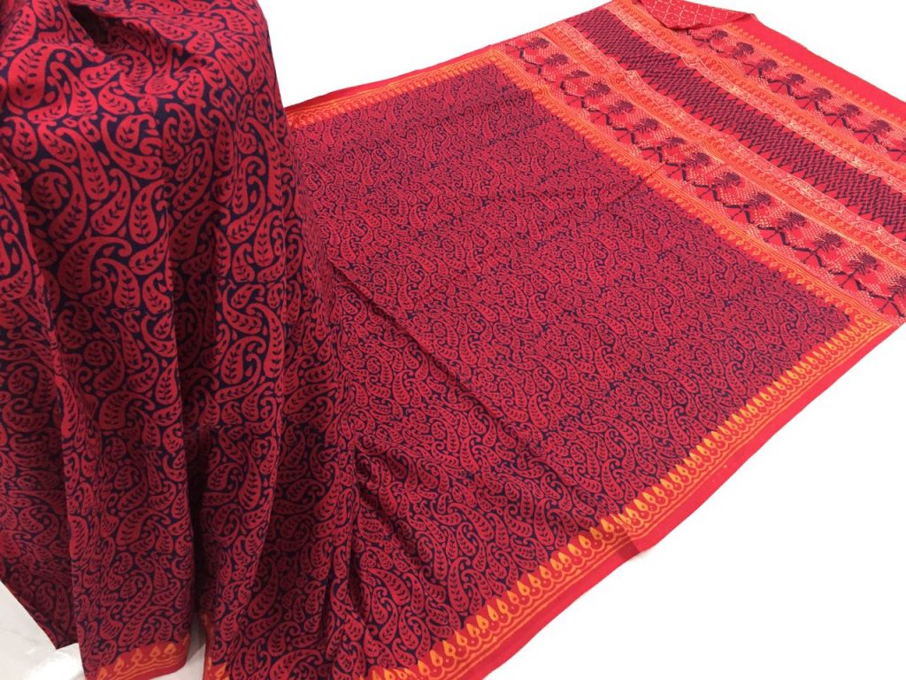 Orange red casual wear leaf bagru print cotton sarees with blouse piece