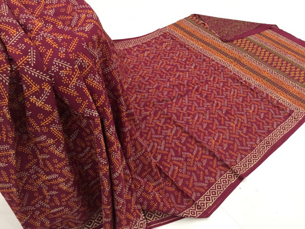 Natural carmine casual wear bagru print cotton sarees with blouse piece