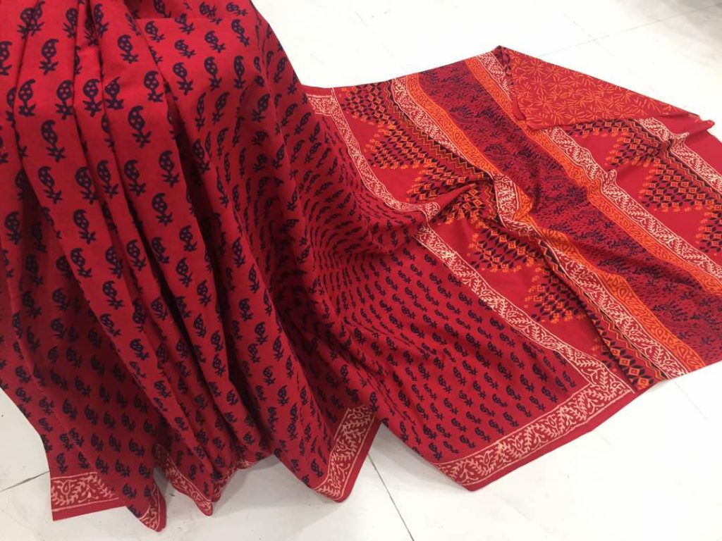 Red regular wear kerry bagru print cotton sarees with blouse piece