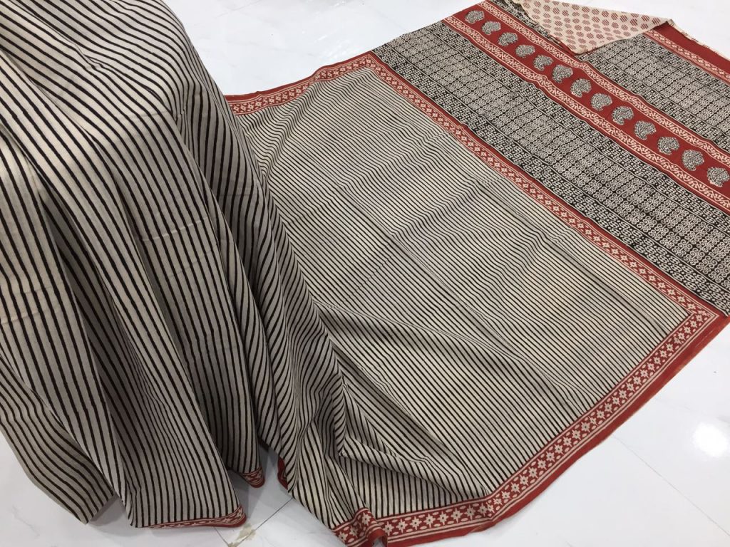 Exclusive champagne maroon regular wear strips bagru print cotton sarees with blouse