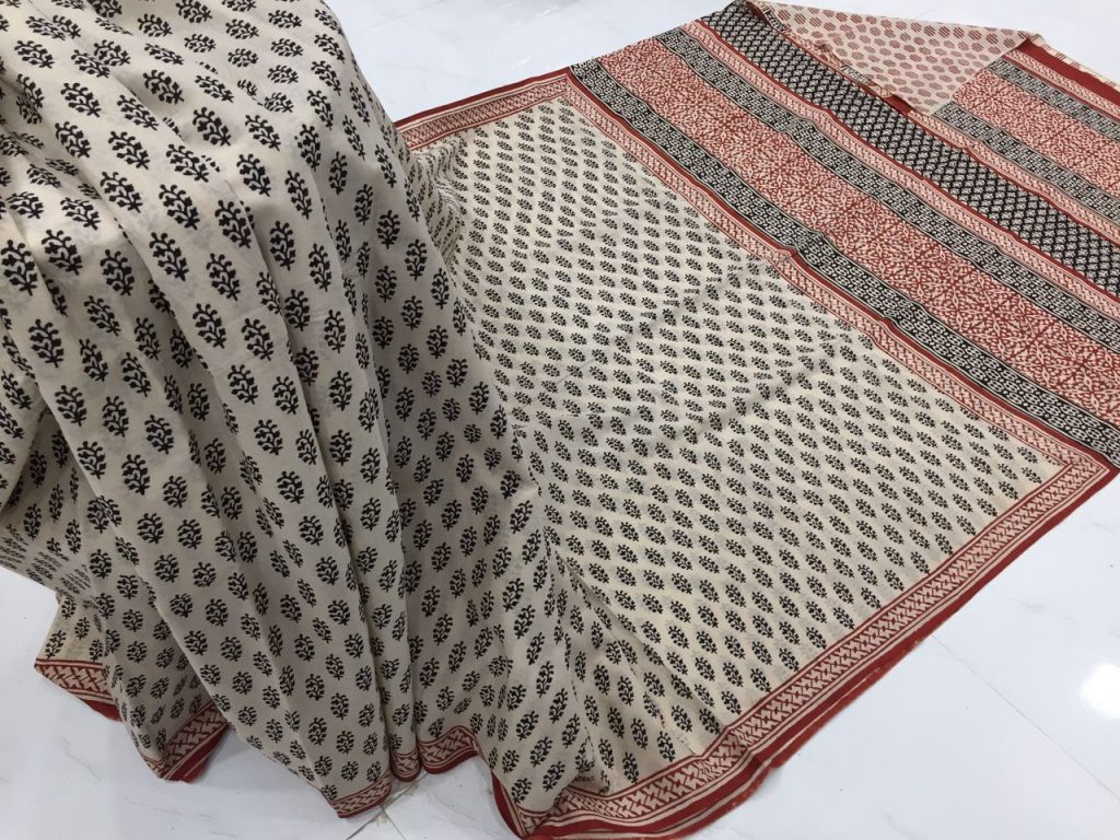 Exclusive champagne regular wear booty bagru print cotton sarees with blouse