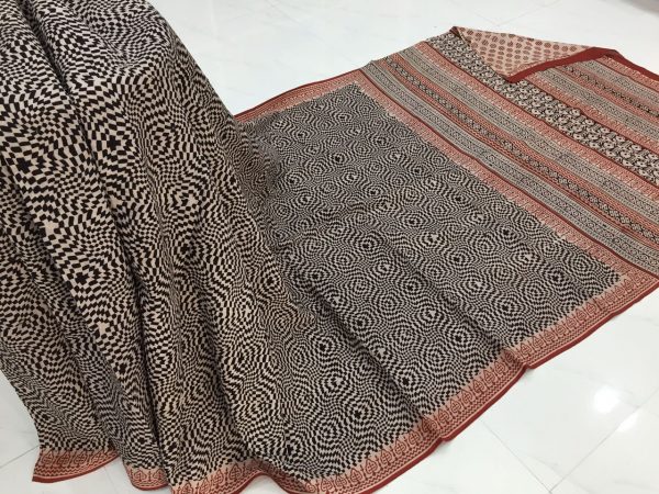 Exclusive champagne black casual  wear zigzag bagru print cotton sarees with blouse