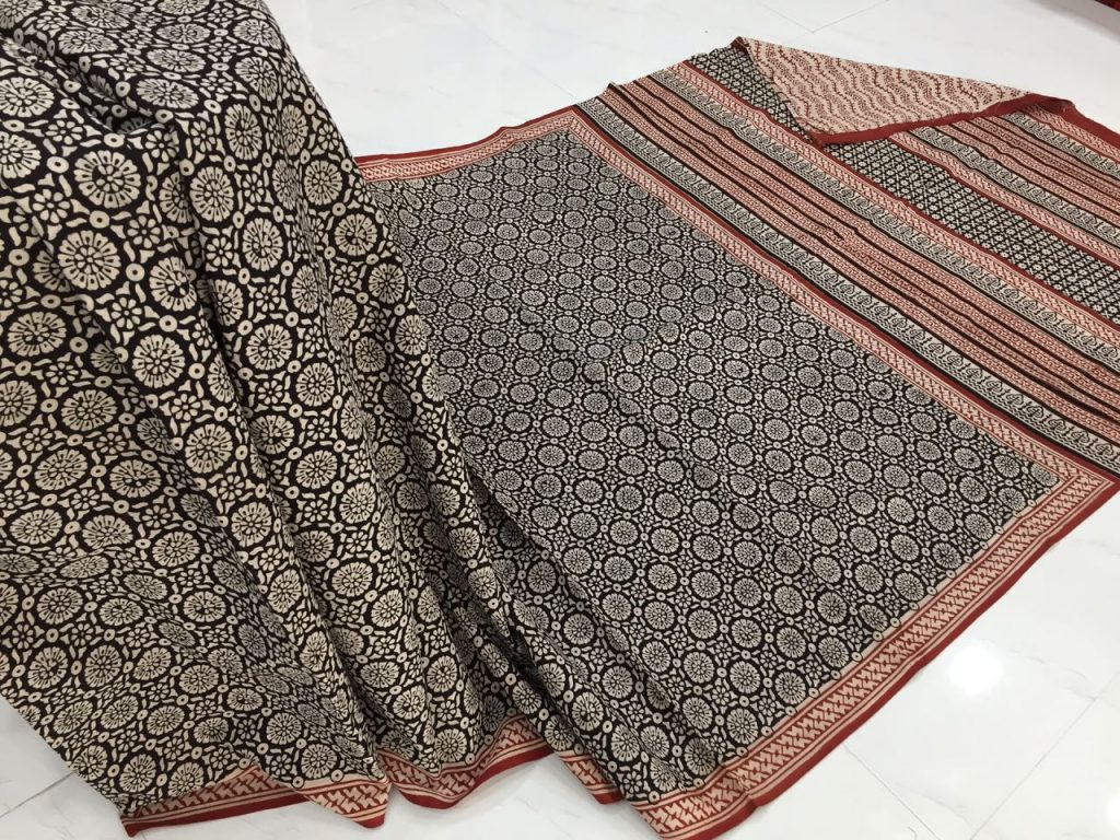 Superior quality champagne black regular wear bagru print cotton sarees with blouse
