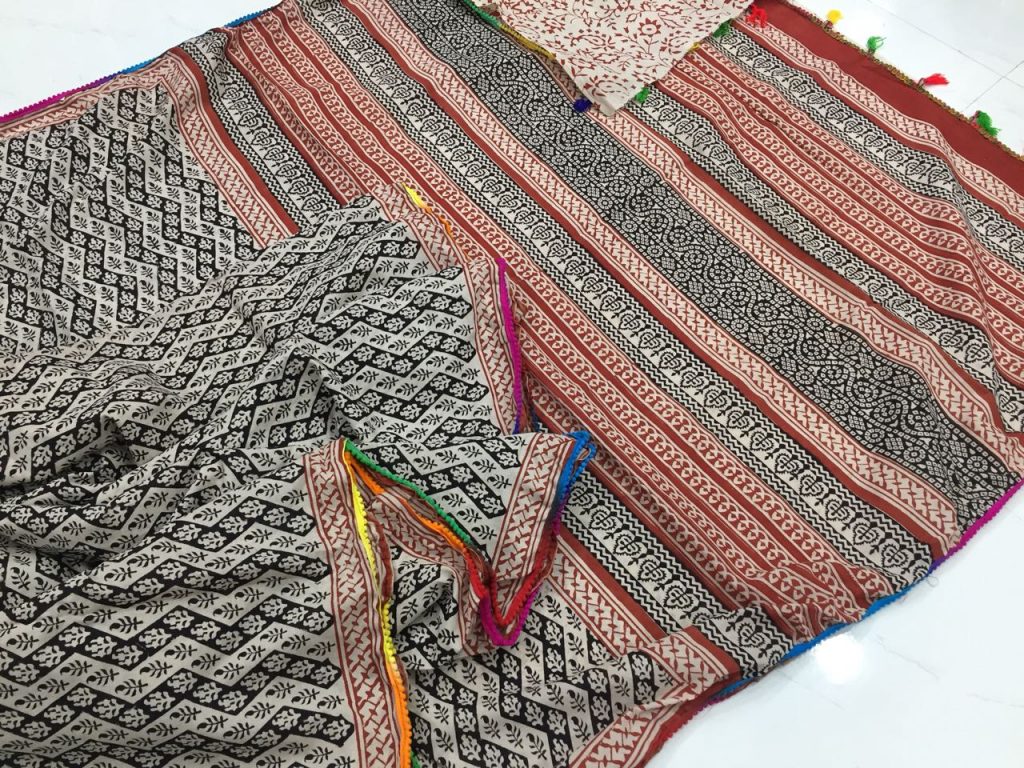 Tan regular wear bagru booty print pompom cotton saree