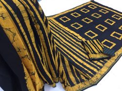 Yellow batik print regular wear zari border cotton mulmul saree with blouse