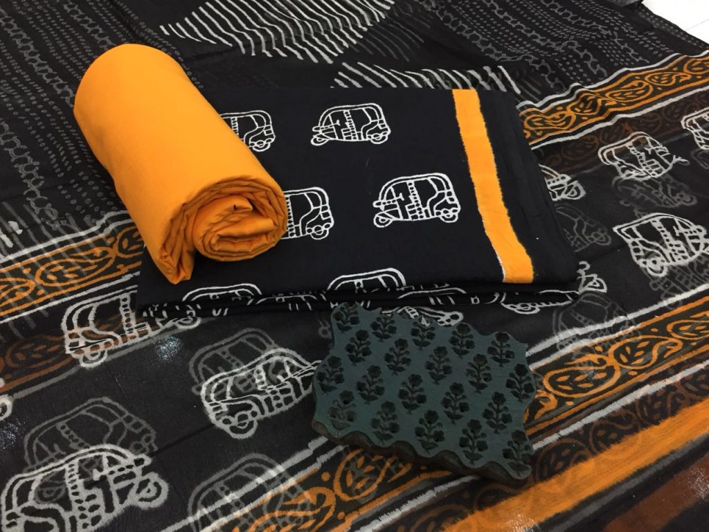 Black and white orange bagru print cotton salwar kameez set with chiffon chunni