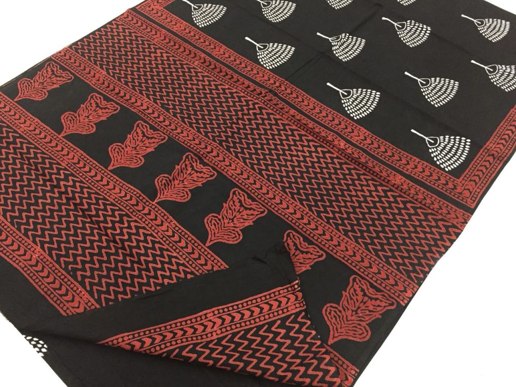 Natural black and white regular wear leaf bagru print cotton sarees with blouse
