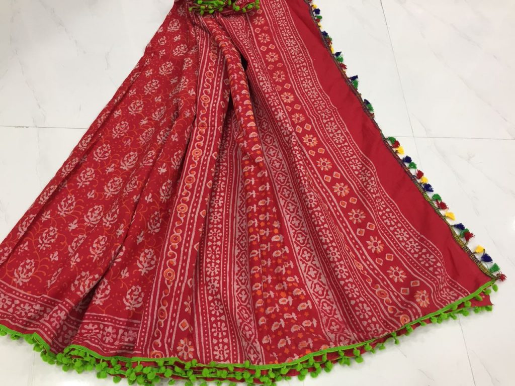 Red regular wear bagru booty print cotton mulmul pompom saree