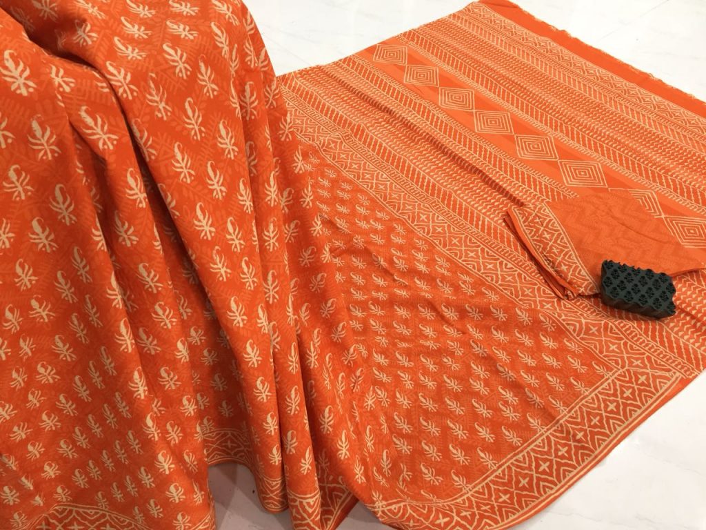 Traditional orange pigment booty print party wear pure mulmul cotton sarees with blouse piece