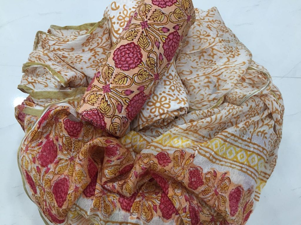 Tan rapid floral prnit casual wear zari border pure cotton suit set