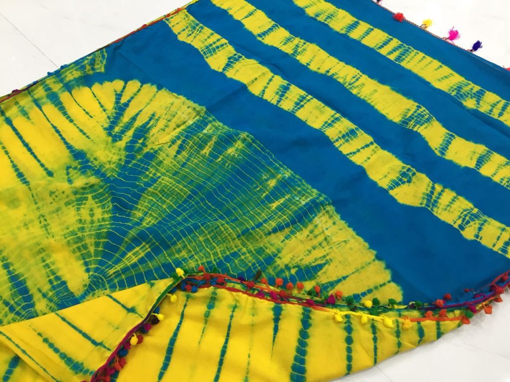 Traditional yellow shibori print pompom cotton mulmul saree with blouse