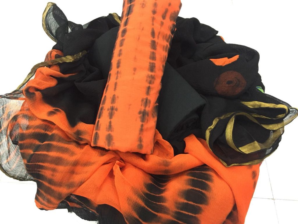 Traditional orange shibori print casual wear zari border cotton suit