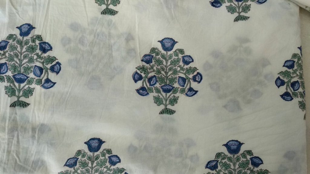 Traditional white mughal print running material
