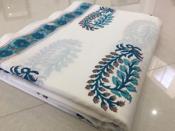 Unstitched white mughal print running material