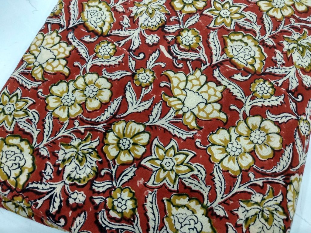 Red rapid floral print running material