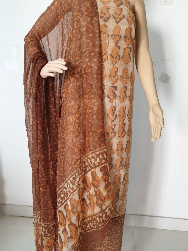 Copper batik print regular wear cotton suits with chiffon dupatta