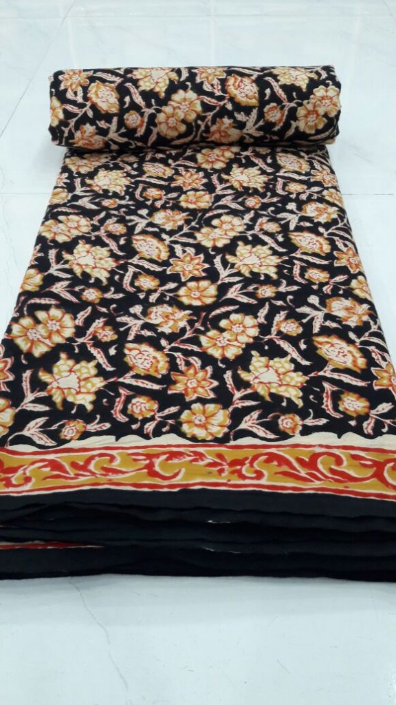 Black rapid floral print cotton running material