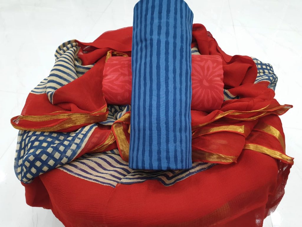 Zari border cotton suit with blue top red bottom
