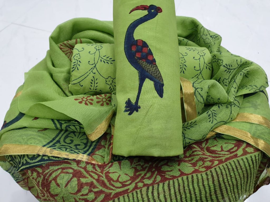 Green crane print zari border suit in pure cotton