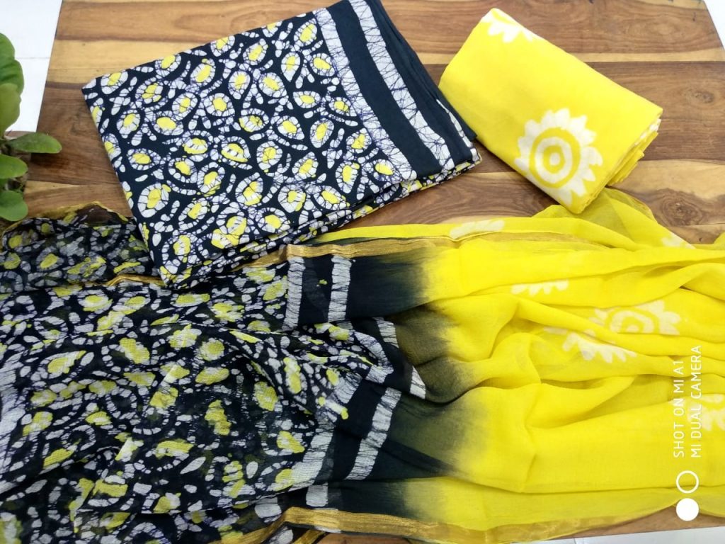 Bright yellow black batik print zari border suit for ladies