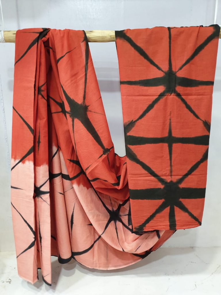 Orange-red and apricot cotton mulmul saree with black borders