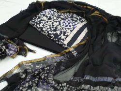 Regular wear black and white zari border cotton suit