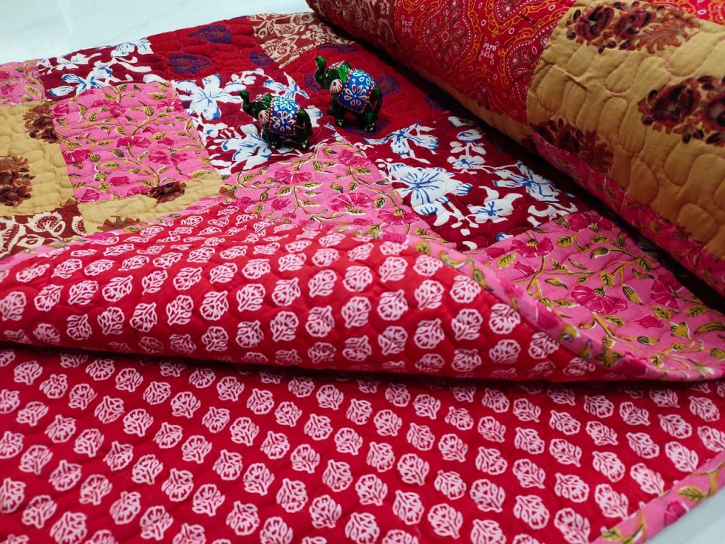 Crimson and pink floral print Hand stitched AC Quilt (Dohar) Patch work