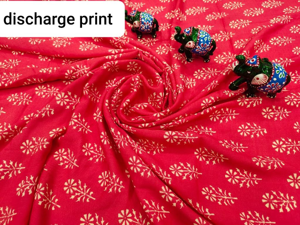 Jaipuri Ceimsnon red rayon running fabric dress material set