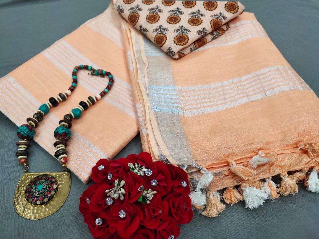 Peach Handloom cotton linen saree with printed cotton blouse