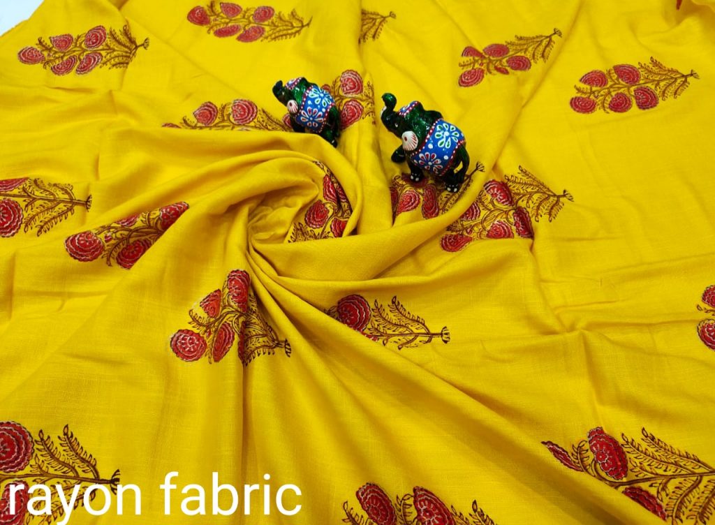 Yellow rayon running dress material set