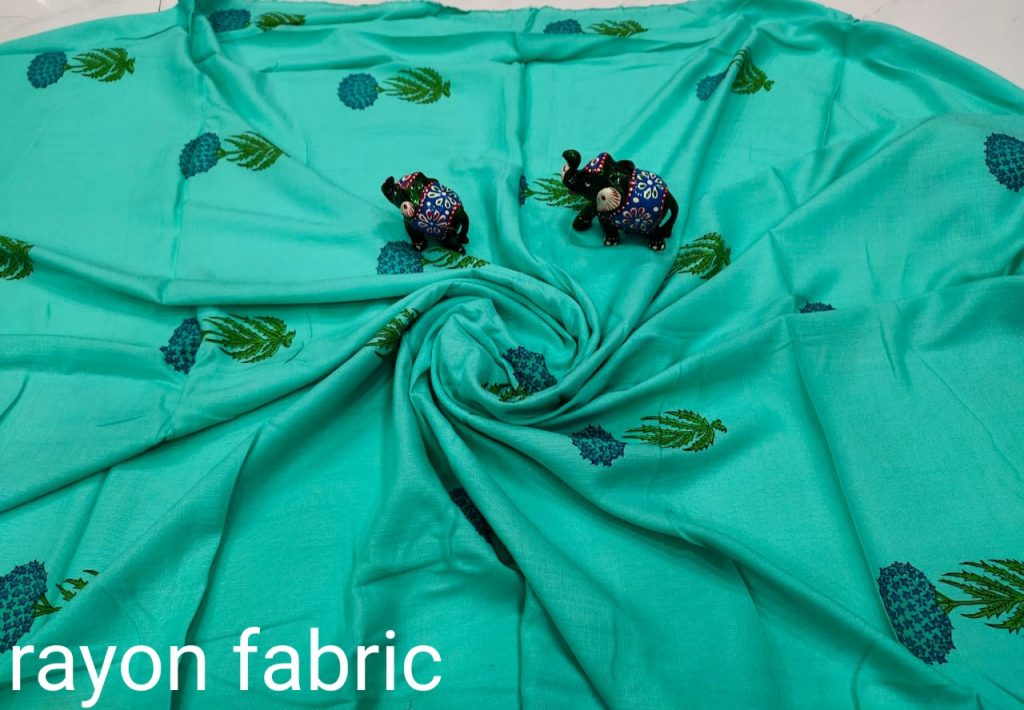 beautiful Turquoise Rayon running dress material set