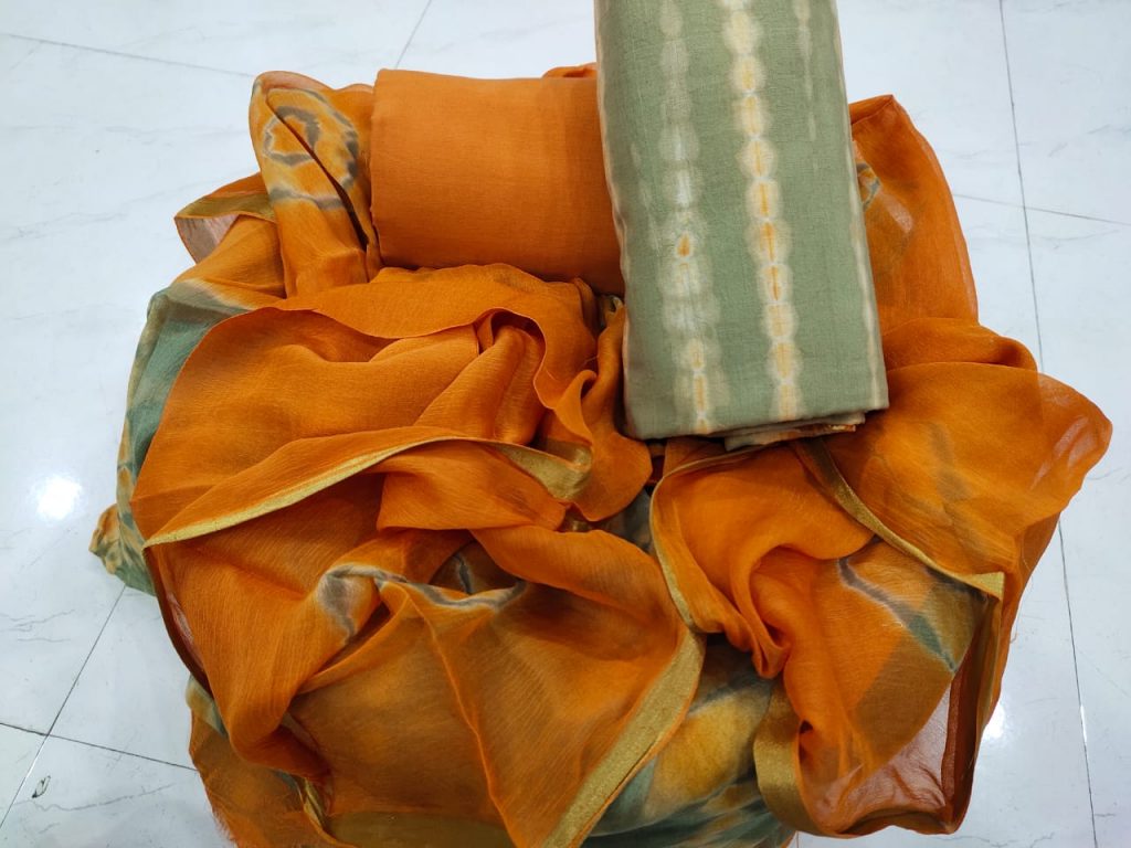 Orange and desert sand zari border salwar suit
