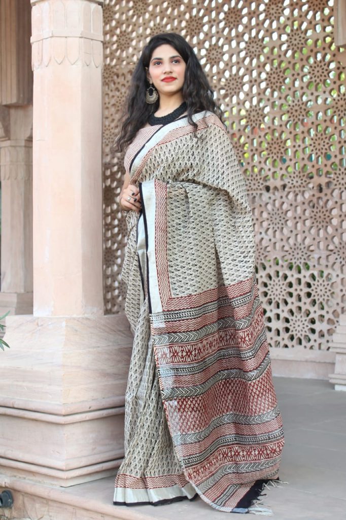 Carmine and beige cotton linen saree with printed cotton blouse