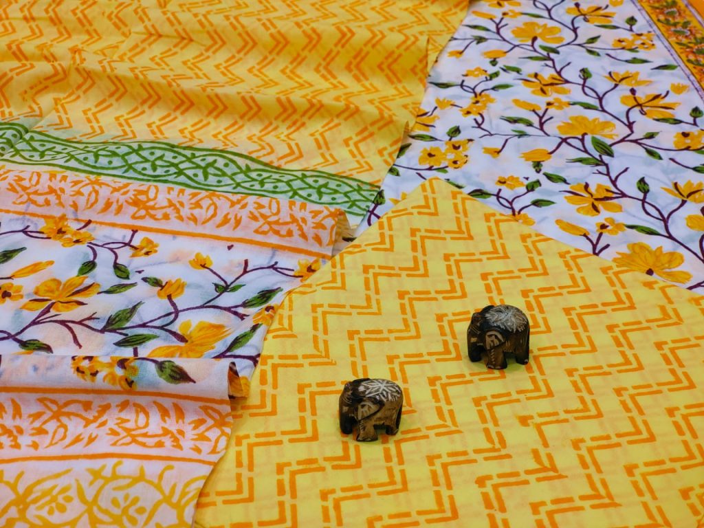 Yellow and white floral print cotton suits with cotton dupatta