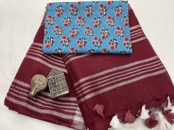 Maroon linen saree with printed cotton blouse