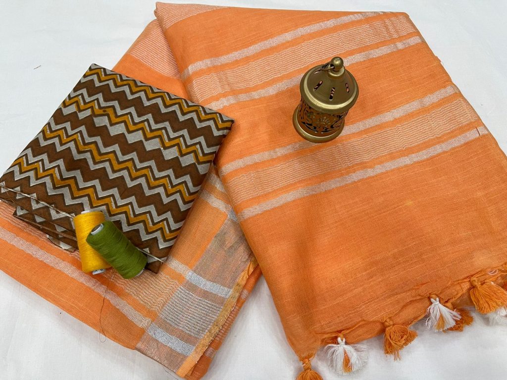 Orange linen saree with printed cotton blouse