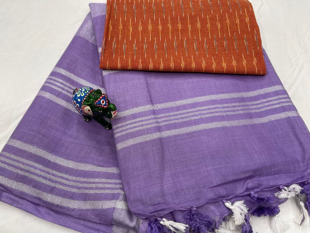 Amethyst color linen saree with red printed blouse