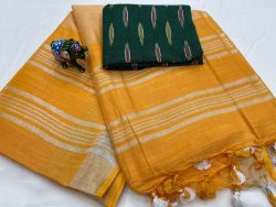 Amber yellow linen saree with green printed blouse