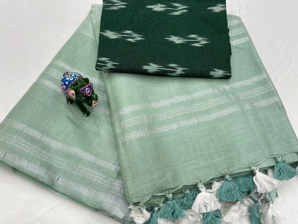 Baby blue linen saree with green printed blouse