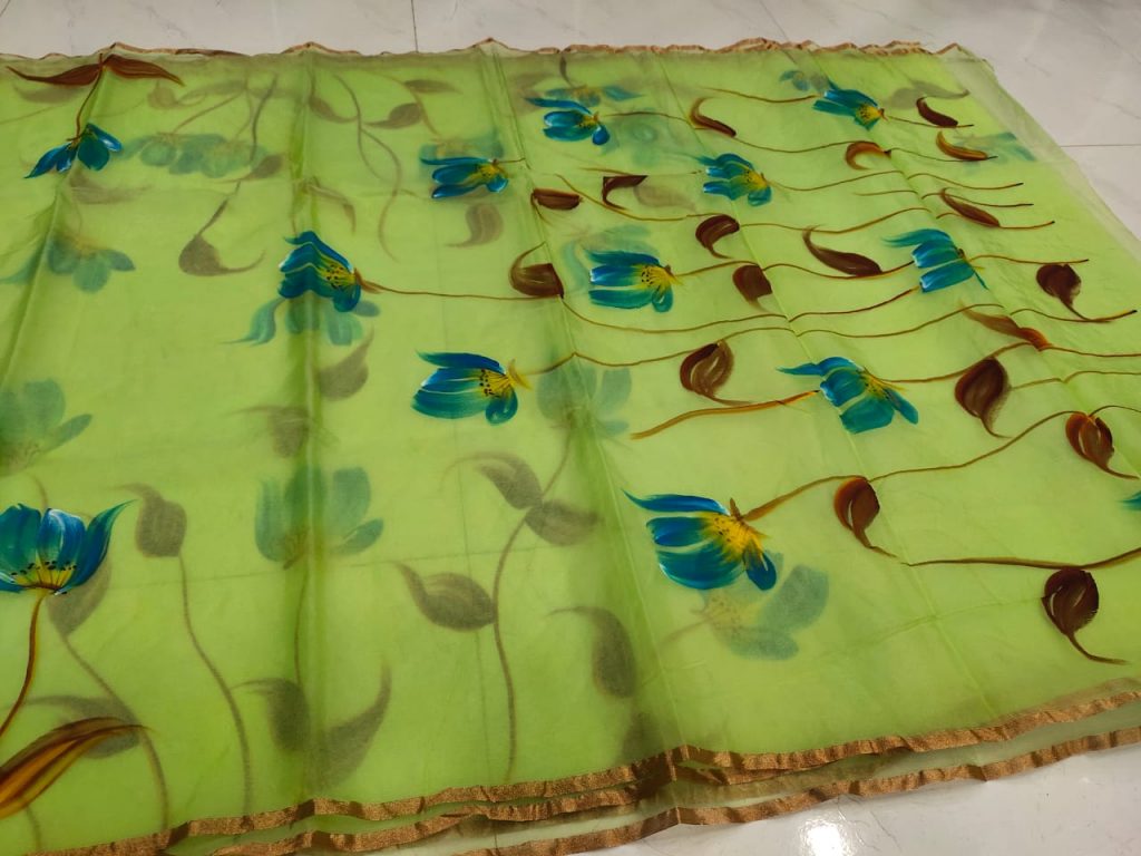 Pear green hand printed organza saree with blouse