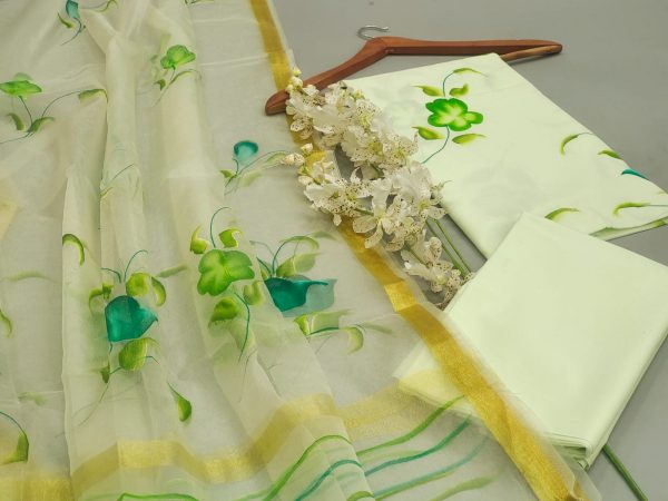 Lite green mugal printed cotton suit with organza dupatta