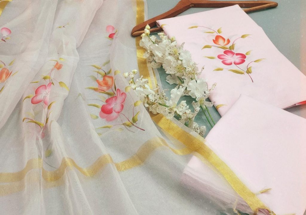 Pink lite apricot mugal print cotton suit with organza dupatta